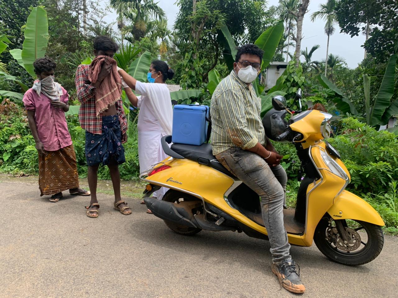 A mobile vaccination team of the district administration administers the vaccine to tribals A mobile vaccination team of the district administration administers the vaccine to tribals