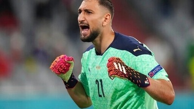 Italy's goalkeeper Gianluigi Donnarumma reacts during the Euro 2020 soccer championship quarterfinal match between Belgium and Italy at the Allianz Arena stadium in Munich, Germany, Friday, July 2, 2021. (AP Photo/Matthias Schrader, Pool) (AP) Italy's goalkeeper Gianluigi Donnarumma reacts during the Euro 2020 soccer championship quarterfinal match between Belgium and Italy at the Allianz Arena stadium in Munich, Germany, Friday, July 2, 2021. (AP Photo/Matthias Schrader, Pool) (AP)