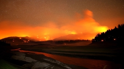 The Salt Fire burns in the hills above Shasta Lake in Lakehead, California. (AFP) The Salt Fire burns in the hills above Shasta Lake in Lakehead, California. (AFP)