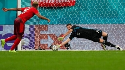 Spain's goalkeeper Unai Simon stops a penalty shot from Switzerland's Manuel Akanji. (AP) Spain's goalkeeper Unai Simon stops a penalty shot from Switzerland's Manuel Akanji. (AP)
