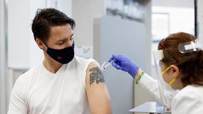 Canada’s Prime Minister Justin Trudeau receives his second dose of the Covid-19 vaccine at a pharmacy in Ottawa, Ontario. (REUTERS) Canada’s Prime Minister Justin Trudeau receives his second dose of the Covid-19 vaccine at a pharmacy in Ottawa, Ontario. (REUTERS)