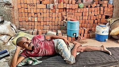 Now Mr Saif lifts himself slightly, rests his head under his right hand and stays silent. (HT Photo) Now Mr Saif lifts himself slightly, rests his head under his right hand and stays silent. (HT Photo)
