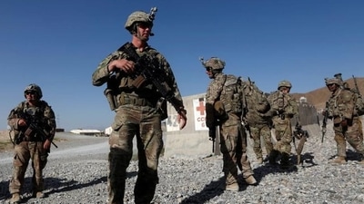 The Americans leave behind a piece of the World Trade Centre buried on the airstrip, and a country that may descend into war all over again. (Reuters)