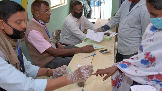 Polling official inks the finger of a voter (ANI/For Representative Purposes)