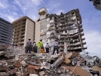 Search and rescue personnel work at the site of a collapsed Florida condominium complex in Surfside, Miami, US.