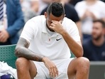 Wimbledon: Australia's Nick Kyrgios reacts after losing his match by a walkover as he sustained an injury and was forced to retire. 