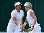 Wimbledon: Sania Mirza and Bethanie Mattek-Sands in action. Wimbledon: Sania Mirza and Bethanie Mattek-Sands in action.