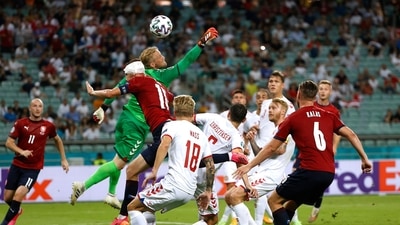 Soccer Football - Euro 2020 - Quarter Final - Czech Republic v Denmark - Baku Olympic Stadium, Baku, Azerbaijan - July 3, 2021 Denmark's Kasper Schmeichel in action with Czech Republic's Tomas Soucek Pool via REUTERS/Valentyn Ogirenko (Pool via REUTERS)