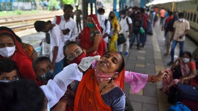 A BMC health worker collects swab samples for Covid-19 test of passengers arriving from outstation trains at Dadar station, in Mumbai, India, on Friday, July 02, 2021. (Photo by Satish Bate/Hindustan Times) A BMC health worker collects swab samples for Covid-19 test of passengers arriving from outstation trains at Dadar station, in Mumbai, India, on Friday, July 02, 2021. (Photo by Satish Bate/Hindustan Times)
