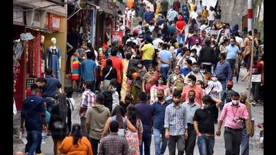 Tourist enjoying a stroll on the Mall Road in Shimla on Saturday. (Deepak Sansta/HT) Tourist enjoying a stroll on the Mall Road in Shimla on Saturday. (Deepak Sansta/HT)