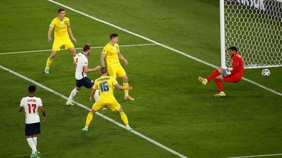 Harry Kane then tripled England's advantage when just four minutes later when another peach of a Luke Shaw cross into the Ukraine area allowed Kane to score off a comfortable header. (AP) Harry Kane then tripled England's advantage when just four minutes later when another peach of a Luke Shaw cross into the Ukraine area allowed Kane to score off a comfortable header. (AP)