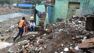Destroyed homes at Ambil Odha near Dandekar Bridge in Pune. (HT PHOTO)