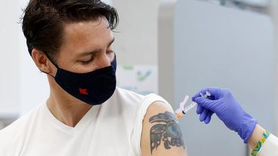 Canada's Prime Minister Justin Trudeau receives his second Covid-19 vaccine at a pharmacy in Ottawa, Canada on July 2, 2021. (REUTERS) Canada's Prime Minister Justin Trudeau receives his second Covid-19 vaccine at a pharmacy in Ottawa, Canada on July 2, 2021. (REUTERS)