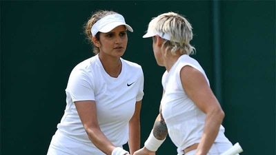 Wimbledon: Sania Mirza and Bethanie Mattek-Sands in action. (Twitter) Wimbledon: Sania Mirza and Bethanie Mattek-Sands in action. (Twitter)