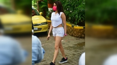Janhvi was snapped outside the gym in Mumbai today. For the outing, she chose an all-white look. (Varinder Chawla) Janhvi was snapped outside the gym in Mumbai today. For the outing, she chose an all-white look. (Varinder Chawla)