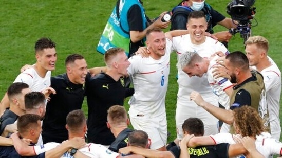 Czech Republic players including goal scorers Patrik Schick, top left, and Tomas Holes, top 4th right, celebrate.(AP) Czech Republic players including goal scorers Patrik Schick, top left, and Tomas Holes, top 4th right, celebrate.(AP)