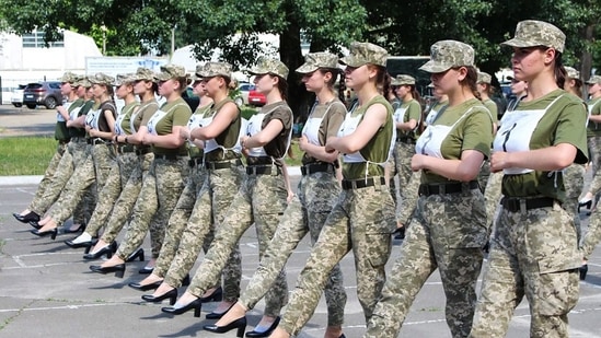 The Ukrainian female soldiers wearing heels while taking part in the military parade rehearsal in Kiev.(Ukrainian Defence ministry press-service / AFP) The Ukrainian female soldiers wearing heels while taking part in the military parade rehearsal in Kiev.(Ukrainian Defence ministry press-service / AFP)