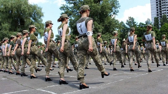 The choice of footwear sparked a torrent of criticism on social media and in parliament, and led to accusations that women soldiers had been sexualised.(AFP) The choice of footwear sparked a torrent of criticism on social media and in parliament, and led to accusations that women soldiers had been sexualised.(AFP)