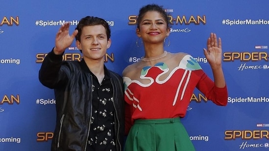 Tom Holland and Zendaya spark dating rumours after they were spotted kissing.