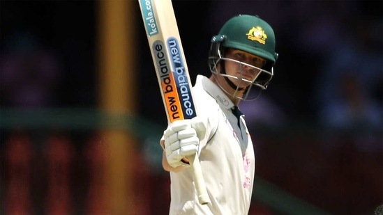 Steve Smith raises his bat after a fifty(Getty)