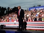 Former US President Donald Trump walks on stage during a rally at the Sarasota Fairgrounds Saturday, July 3, 2021, in Sarasota, Fla. (AP Photo/Jason Behnken) Former US President Donald Trump walks on stage during a rally at the Sarasota Fairgrounds Saturday, July 3, 2021, in Sarasota, Fla. (AP Photo/Jason Behnken)