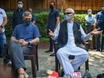Srinagar: J&K National Conference President Farooq Abdullah with party Vice President Omar Abdullah talks to the media on their arrival from Delhi after attending the all-party meeting with Prime Minister Narendra Modi, in Srinagar, Saturday, June 26, 2021. Srinagar: J&K National Conference President Farooq Abdullah with party Vice President Omar Abdullah talks to the media on their arrival from Delhi after attending the all-party meeting with Prime Minister Narendra Modi, in Srinagar, Saturday, June 26, 2021.