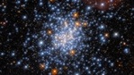 The image uses observations from Hubble’s Wide Field Camera 3 and incorporates data from two very different astronomical investigations. (ESA/Hubble & NASA, J. Kalirai, A. Milone) The image uses observations from Hubble’s Wide Field Camera 3 and incorporates data from two very different astronomical investigations. (ESA/Hubble & NASA, J. Kalirai, A. Milone)