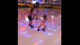 The image shows four-year-old Meiah participating in the skating competition.