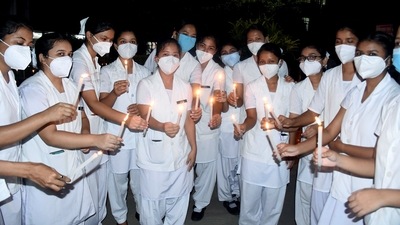 On Doctors' Day, nurses in Guwahati light candles to pay tribute to the doctors who lost their lives during the Covid-19 pandemic. (ANI Photo) On Doctors' Day, nurses in Guwahati light candles to pay tribute to the doctors who lost their lives during the Covid-19 pandemic. (ANI Photo)