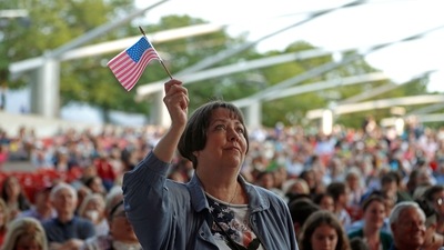US Air Force veteran from Chicago, stands during an Independence Day music festival. (AP) US Air Force veteran from Chicago, stands during an Independence Day music festival. (AP)