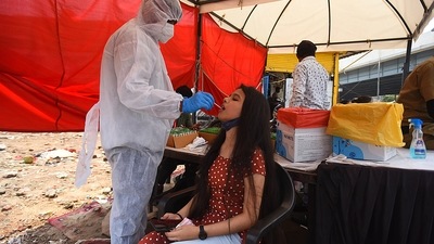 A person being tested for Covid-19 during random screening at Seemapuri Border in New Delhi on July 4. The number of new Covid-19 tests conducted in this period stood at 75,133, down slightly from 76,619 on July 3, taking the number of tests conducted till now to 21,709,756, HT reported. (Raj K Raj / HT Photo) A person being tested for Covid-19 during random screening at Seemapuri Border in New Delhi on July 4. The number of new Covid-19 tests conducted in this period stood at 75,133, down slightly from 76,619 on July 3, taking the number of tests conducted till now to 21,709,756, HT reported. (Raj K Raj / HT Photo)