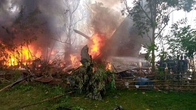 The military aircraft was seen on fire after it crashed in Patikul, Sulu, on Sunday. Initial reports said that at least 40 passengers have been rescued. (Photo via Pondohan TV / Facebook) The military aircraft was seen on fire after it crashed in Patikul, Sulu, on Sunday. Initial reports said that at least 40 passengers have been rescued. (Photo via Pondohan TV / Facebook)