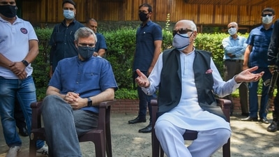 Srinagar: J&K National Conference President Farooq Abdullah with party Vice President Omar Abdullah talks to the media on their arrival from Delhi after attending the all-party meeting with Prime Minister Narendra Modi, in Srinagar, Saturday, June 26, 2021. (PTI) Srinagar: J&K National Conference President Farooq Abdullah with party Vice President Omar Abdullah talks to the media on their arrival from Delhi after attending the all-party meeting with Prime Minister Narendra Modi, in Srinagar, Saturday, June 26, 2021. (PTI)