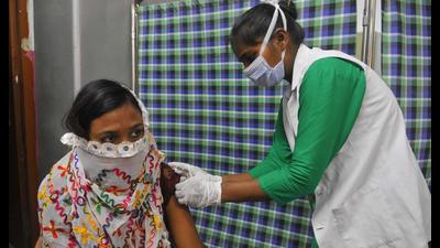 A health worker administering the Covid vaccine to a woman at government school in Sector 45, Chandigarh. (Keshav Singh/HT) A health worker administering the Covid vaccine to a woman at government school in Sector 45, Chandigarh. (Keshav Singh/HT)