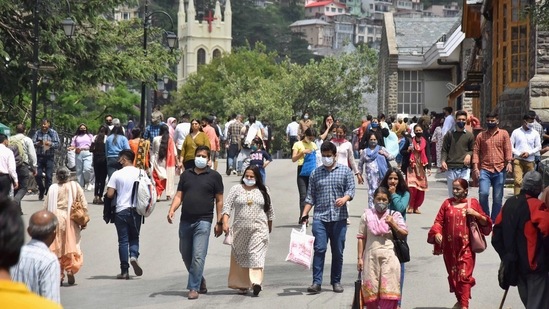 ourists and locals were seen walking on the Ridge Road as the Himachal Pradesh government eased Covid restrictions in the state since June 14. ((PTI Photo))
