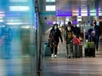 Passengers walk through a terminal at Frankfurt airport in Germany.(Reuters File Photo)