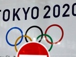The logo of Tokyo 2020 Olympic Games, that have been postponed to 2021, is seen through a traffic sign at Tokyo Metropolitan Government Office building in Tokyo, Japan. (File photo) The logo of Tokyo 2020 Olympic Games, that have been postponed to 2021, is seen through a traffic sign at Tokyo Metropolitan Government Office building in Tokyo, Japan. (File photo)