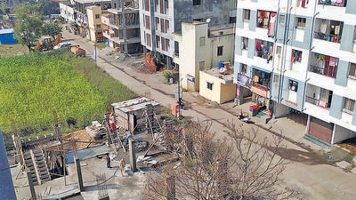 Newly building construction in farm area of Kirkatwadi village on Sinhgad road in Pune. (HT PHOTO) Newly building construction in farm area of Kirkatwadi village on Sinhgad road in Pune. (HT PHOTO)