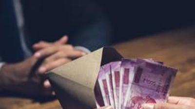 The officer was also seeking a fixed payment of  ₹3 lakh a month for allowing the business to run smoothly. (HT FILE PHOTO)