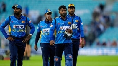 Sri Lanka's captain Kusal Perera, front right, walks off the field with his teammates after they were defeated by 8 wickets in the second one day international cricket match by England. (AP) Sri Lanka's captain Kusal Perera, front right, walks off the field with his teammates after they were defeated by 8 wickets in the second one day international cricket match by England. (AP)