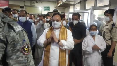 BJP president JP Nadda and chief minister Jai Ram Thakur visiting veteran Congress leader and former chief minister Virbhadra Singh at Indira Gandhi Medical College and Hospital in Shimla on Monday. (HT Photo) BJP president JP Nadda and chief minister Jai Ram Thakur visiting veteran Congress leader and former chief minister Virbhadra Singh at Indira Gandhi Medical College and Hospital in Shimla on Monday. (HT Photo)