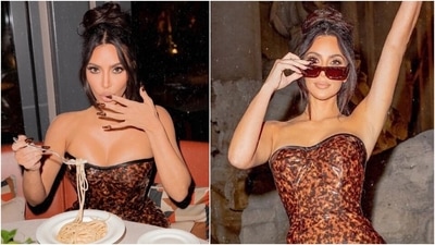 Kim Kardashian in mini vinyl dress has her Dolce Vita moment at Trevi Fountain (Instagram/@kimkardashian) Kim Kardashian in mini vinyl dress has her Dolce Vita moment at Trevi Fountain (Instagram/@kimkardashian)