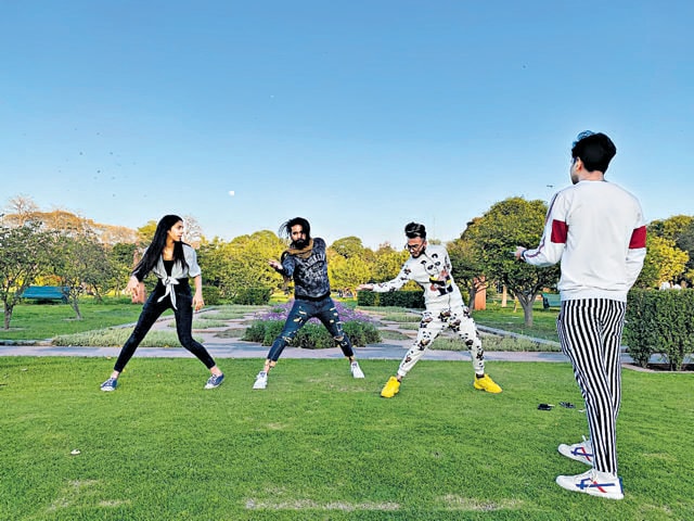 Young folks making short dance videos tuned to Punjabi pop. (Mayank Austen Soofi/HT Photo)