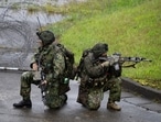 Japanese soldiers train during a joint military drill between Japan Self-Defense Forces, French Army and US Marines, at the Kirishima exercise area in Ebino, Miyazaki prefecture, Japan. Japanese soldiers train during a joint military drill between Japan Self-Defense Forces, French Army and US Marines, at the Kirishima exercise area in Ebino, Miyazaki prefecture, Japan.