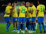 Brazil's teammates celebrate their team's 1-0 victory over Peru during Copa America semifinal(AP) Brazil's teammates celebrate their team's 1-0 victory over Peru during Copa America semifinal(AP)