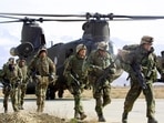 In this file photo taken on March 11, 2002 US soldiers returning from the Gardez battlefield leave a Chinook helicopter at the US base in Bagram. (AFP) In this file photo taken on March 11, 2002 US soldiers returning from the Gardez battlefield leave a Chinook helicopter at the US base in Bagram. (AFP)
