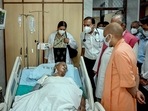 Uttar Pradesh chief minister Yogi Adityanath visits former chief minister Kalyan Singh, at Sanjay Gandhi Post Graduate Institute of Medical Sciences on Tuesday. (PTI) Uttar Pradesh chief minister Yogi Adityanath visits former chief minister Kalyan Singh, at Sanjay Gandhi Post Graduate Institute of Medical Sciences on Tuesday. (PTI)