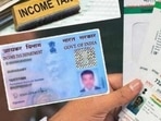 The 12-digit Aadhaar number is required in order to download an e-PAN from the official Income Tax e-filing website.(HT file) The 12-digit Aadhaar number is required in order to download an e-PAN from the official Income Tax e-filing website.(HT file)