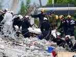 No one has been rescued alive since the first hours after the collapse, but rescuers were still holding out hope of reuniting loved ones.(AP) No one has been rescued alive since the first hours after the collapse, but rescuers were still holding out hope of reuniting loved ones.(AP)
