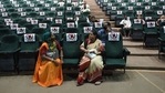 People sit after getting a dose of the Covishield vaccine against the Covid-19 coronavirus during a vaccination drive at Tagore Hall in Ahmedabad on July 6, 2021.(AFP) People sit after getting a dose of the Covishield vaccine against the Covid-19 coronavirus during a vaccination drive at Tagore Hall in Ahmedabad on July 6, 2021.(AFP)